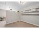 Bedroom featuring neutral carpet, ample storage shelves and a view at 717 E 4Th Ave, Longmont, CO 80504