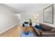 Bright living room with hardwood floors, comfortable seating, and modern decor at 717 E 4Th Ave, Longmont, CO 80504