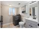 Laundry room featuring a washer and dryer, a sink, and a storage cabinet at 8004 S Field St, Littleton, CO 80128