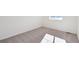 Neutral bedroom features carpeted floors, a window, and white trim and walls at 17949 Dandy Brush Ln, Parker, CO 80134