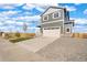 Charming two-story home featuring a two-car garage and neutral siding at 17949 Dandy Brush Ln, Parker, CO 80134