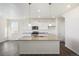 Bright kitchen with granite countertops, stainless appliances, and island sink at 17949 Dandy Brush Ln, Parker, CO 80134