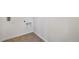 The laundry room has tile flooring, white trim, and convenient hookups at 17949 Dandy Brush Ln, Parker, CO 80134