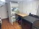 Basement laundry area with washer, dryer and shelving at 645 S Perry St, Denver, CO 80219