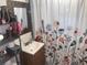 Clean bathroom with floral shower curtain and updated vanity at 645 S Perry St, Denver, CO 80219