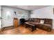Inviting living room featuring hardwood floors, neutral walls, and a comfortable seating area for relaxing at 6903 W 52Nd Pl, Arvada, CO 80002