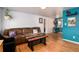 Inviting living room featuring hardwood floors, neutral walls, and a comfortable seating area for relaxing at 6903 W 52Nd Pl, Arvada, CO 80002