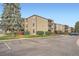 Spacious condo complex with multiple stories, private balconies, and ample parking at 2231 S Vaughn Way # 114B, Aurora, CO 80014