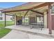 Community picnic and grilling area with covered seating and barbecue equipment at 2231 S Vaughn Way # 114B, Aurora, CO 80014