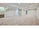 Spacious finished basement with carpet flooring and recessed lighting at 6596 Silverleaf Ave, Firestone, CO 80504