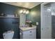 Stylish bathroom featuring a vanity with quartz countertop and a designer sink at 2575 S Syracuse Way # M206, Denver, CO 80231