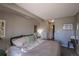 Neutral bedroom with carpet, walk-in closet, and ensuite bathroom for added privacy at 2575 S Syracuse Way # M206, Denver, CO 80231