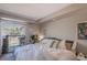 Cozy bedroom featuring a balcony, perfect for relaxing and enjoying the view at 2575 S Syracuse Way # M206, Denver, CO 80231