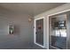 Apartment front door with a wreath, unit number 206, and a fire extinguisher at 2575 S Syracuse Way # M206, Denver, CO 80231