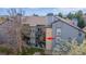 Condo building featuring upper level balcony and well manicured lawn at 2575 S Syracuse Way # M206, Denver, CO 80231