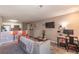 Open living area featuring a breakfast bar, and space for a home office setup at 2575 S Syracuse Way # M206, Denver, CO 80231