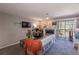 Comfortable living room with a fireplace, balcony access, and modern decor at 2575 S Syracuse Way # M206, Denver, CO 80231