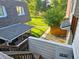 Cozy backyard view from porch, featuring a well-maintained lawn and charming wooden fence at 1125 S Oneida St # F, Denver, CO 80224