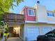 Charming multi-level home with a covered parking and a balcony at 1125 S Oneida St # F, Denver, CO 80224