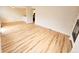 Bright and spacious living room with hardwood floors and fireplace at 1125 S Oneida St # F, Denver, CO 80224