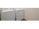 Laundry room features a white washing machine and dryer at 1639 Pinnacle Ave, Lochbuie, CO 80603