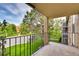 Private balcony overlooking green space and building at 13500 E Cornell Ave # 309, Aurora, CO 80014