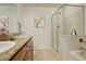 Double vanity bathroom with a large shower and soaking tub at 1950 N Logan St # 102, Denver, CO 80203