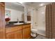 Bathroom with shower/tub combo and granite countertop at 1950 N Logan St # 102, Denver, CO 80203