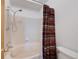 Bathroom featuring a shower and tub with a patterned curtain at 11366 Haswell Dr, Parker, CO 80134
