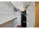 Walk-in closet with multiple shelves and a locked safe at 11366 Haswell Dr, Parker, CO 80134