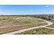 Aerial view showcasing community field and walking path at 9522 Castle Ridge Cir, Highlands Ranch, CO 80129