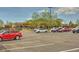 Parking lot near a one-story brick building with ample parking and landscaping at 9522 Castle Ridge Cir, Highlands Ranch, CO 80129
