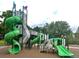 Colorful playground featuring multiple slides and climbing structures, great for entertainment at 9522 Castle Ridge Cir, Highlands Ranch, CO 80129