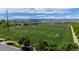 Aerial view of a lush green soccer field with mountain views, a wonderful setting for sports and recreation at 9522 Castle Ridge Cir, Highlands Ranch, CO 80129
