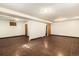 Unfinished basement with dark flooring and plenty of space for storage at 7232 Kalamath St, Denver, CO 80221