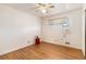 Bedroom with hardwood floors, a ceiling fan, and a bright window at 7232 Kalamath St, Denver, CO 80221