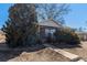 Quaint brick home with a walkway leading to the front door at 7232 Kalamath St, Denver, CO 80221