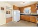 Classic kitchen featuring wood cabinets and ample counter space at 7232 Kalamath St, Denver, CO 80221