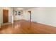 Inviting living room featuring lustrous hardwood flooring at 7232 Kalamath St, Denver, CO 80221