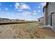 New home backyard awaiting landscaping with ample space for outdoor activities at 24737 E 40Th Ave, Aurora, CO 80019