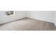 Cozy bedroom with neutral carpet and a large window offering ample natural light at 24737 E 40Th Ave, Aurora, CO 80019