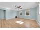 Inviting living room features hardwood floors, lots of light, and neutral wall color at 1209 Locust St, Denver, CO 80220