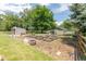 Large lot features garden boxes, storage buildings and plenty of space to enjoy the outdoors at 13990 Berry Rd, Golden, CO 80401