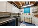 Functional laundry room with modern washer and dryer and ample storage at 2140 S Youngfield St, Lakewood, CO 80228