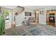 Welcoming living room showcases a leather recliner, a decorative rug, and artwork at 5864 Turnstone Pl, Castle Rock, CO 80104