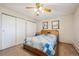 Bedroom with carpet, ceiling fan and window at 710 S Clinton St # 1A, Denver, CO 80247