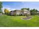 Beautiful condominium complex featuring well-maintained landscaping and inviting facade at 710 S Clinton St # 1A, Denver, CO 80247