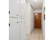 Hallway with tiled floor and front door at 710 S Clinton St # 1A, Denver, CO 80247