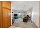 Bright living area, with neutral carpet, sliding glass door, and spacious open concept at 710 S Clinton St # 1A, Denver, CO 80247