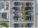 An aerial view of a neighborhood, showcasing the rooftops, lawns, and layout of the community at 8132 Mt Harvard Rd, Littleton, CO 80125